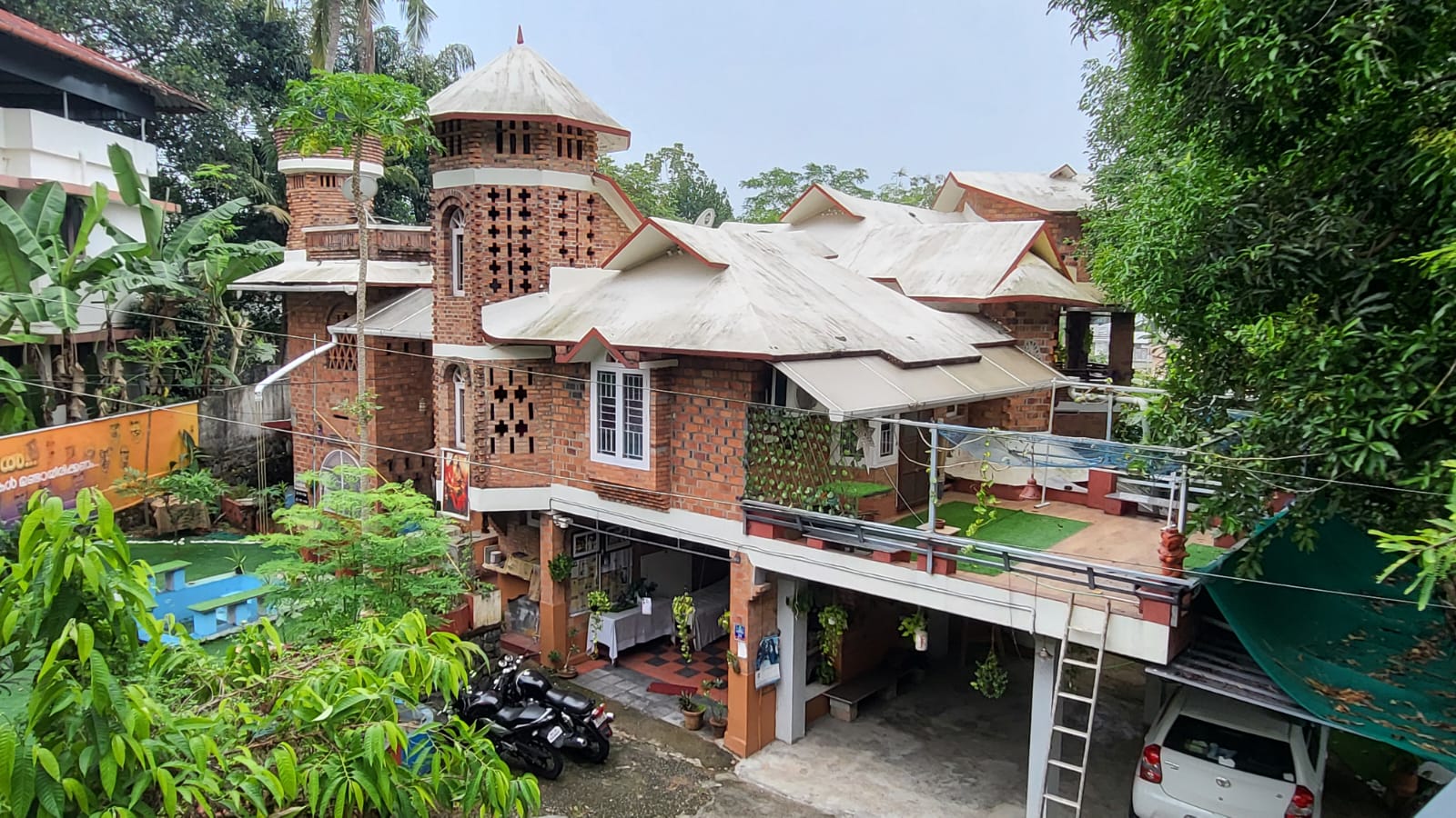 Devasramam luxury heritage villa interior and exterior view 1 - traditional Kerala architecture with modern amenities