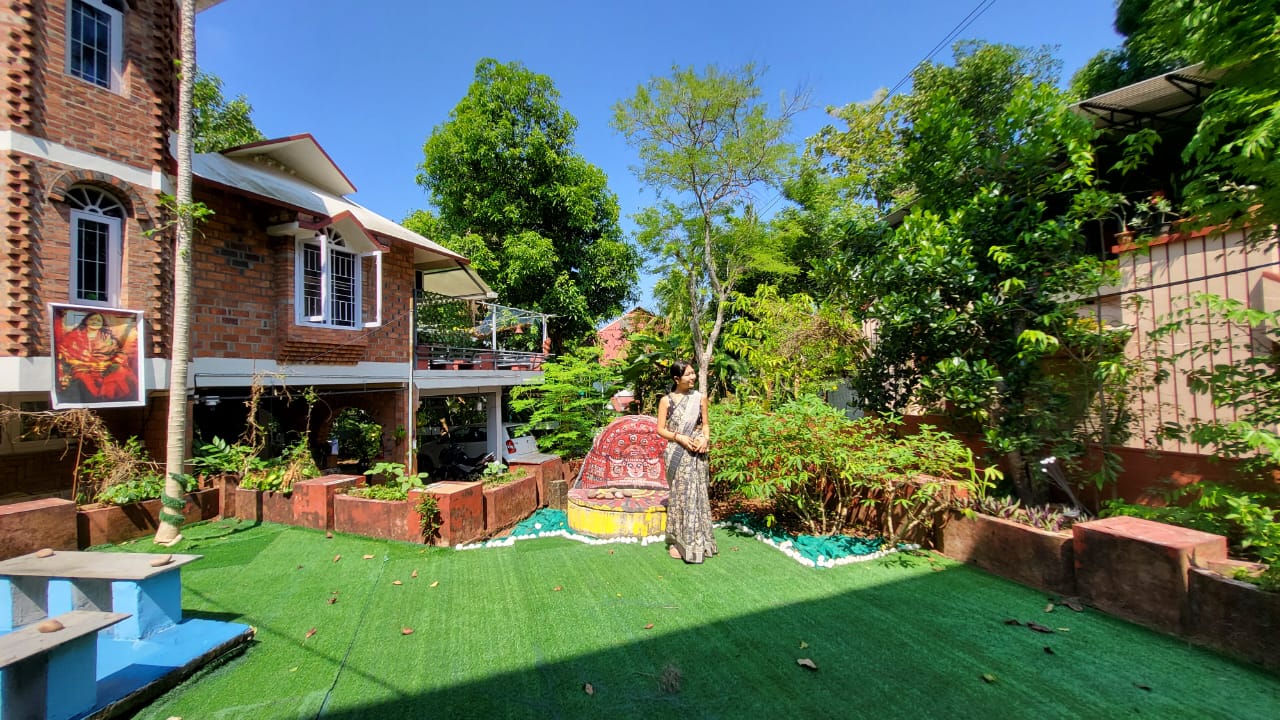 Devasramam luxury heritage villa in Kerala showcasing traditional architecture with modern amenities surrounded by lush tropical greenery